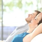Man-and-woman-breathing-clean-indoor-air